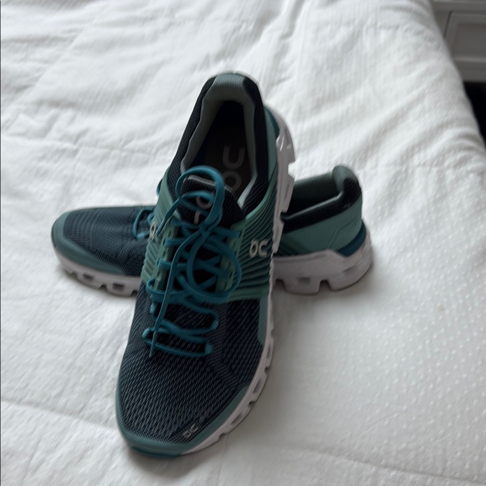 On Running Blue Athletic Shoes with Streamlined Design